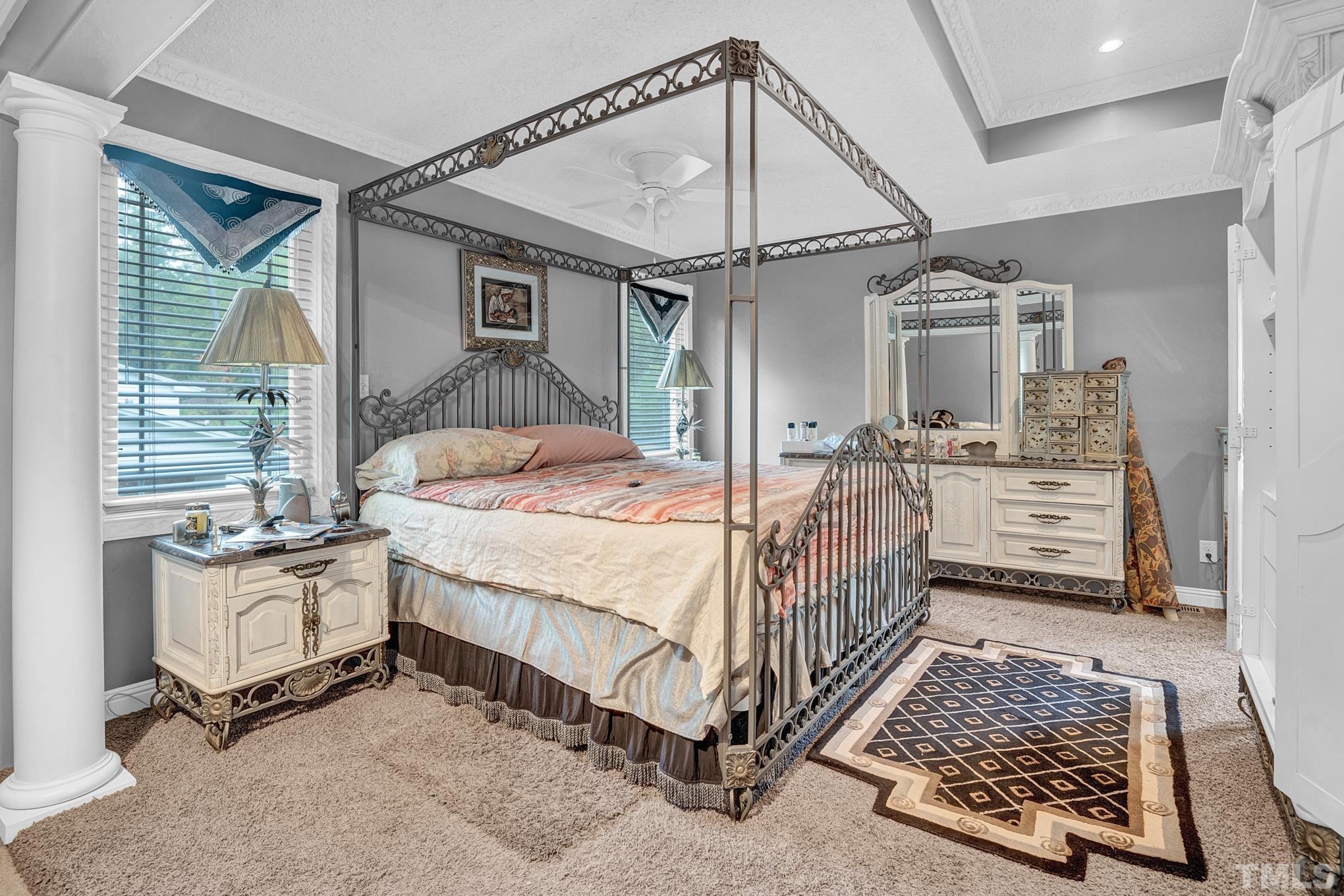 2206 Lyndhurst Drive Raleigh, NC 27610 - Photo 11 of 17 a bedroom with bed and a table