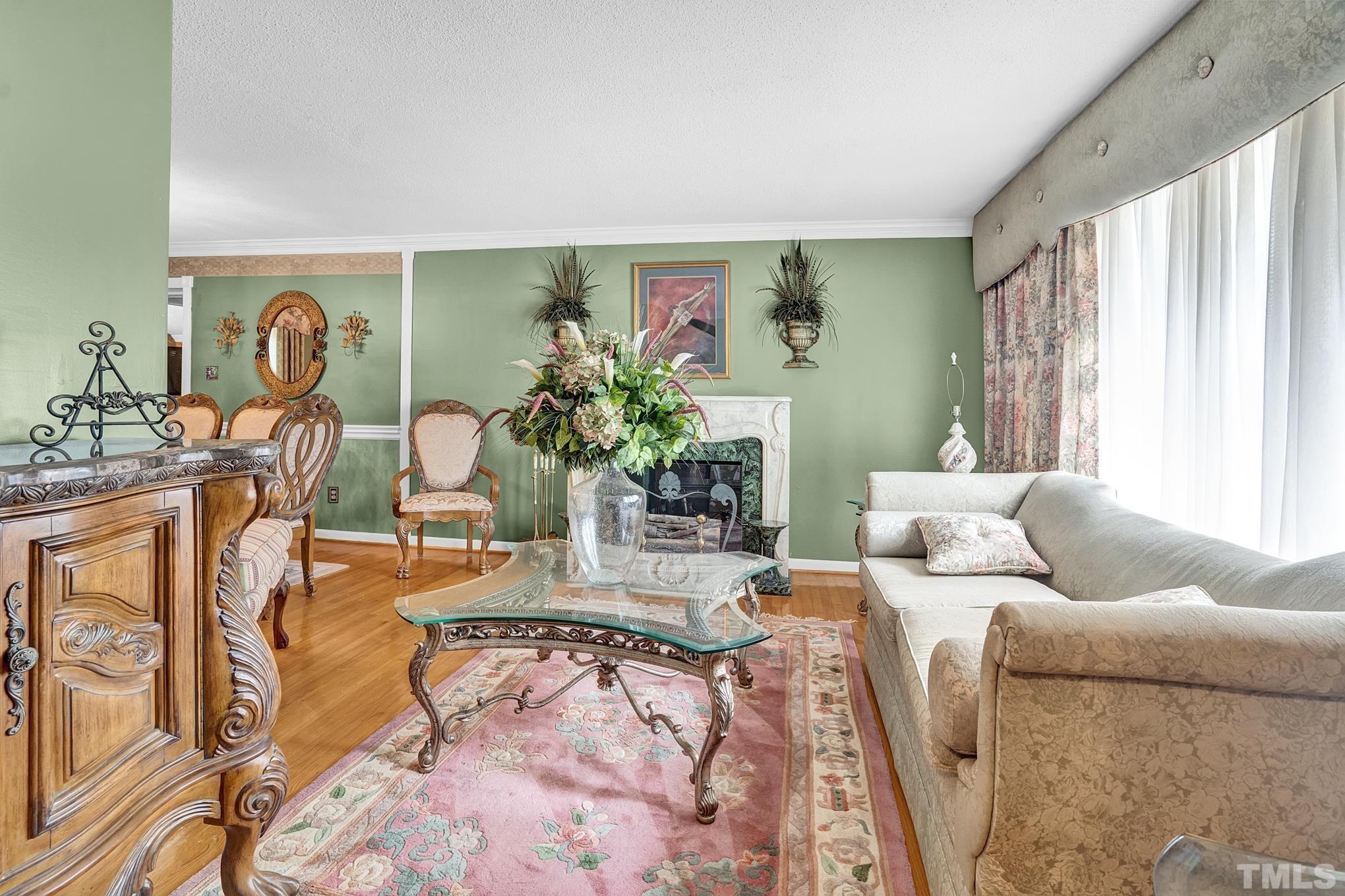 2206 Lyndhurst Drive Raleigh, NC 27610 - Photo 7 of 17 a living room with furniture and a large window