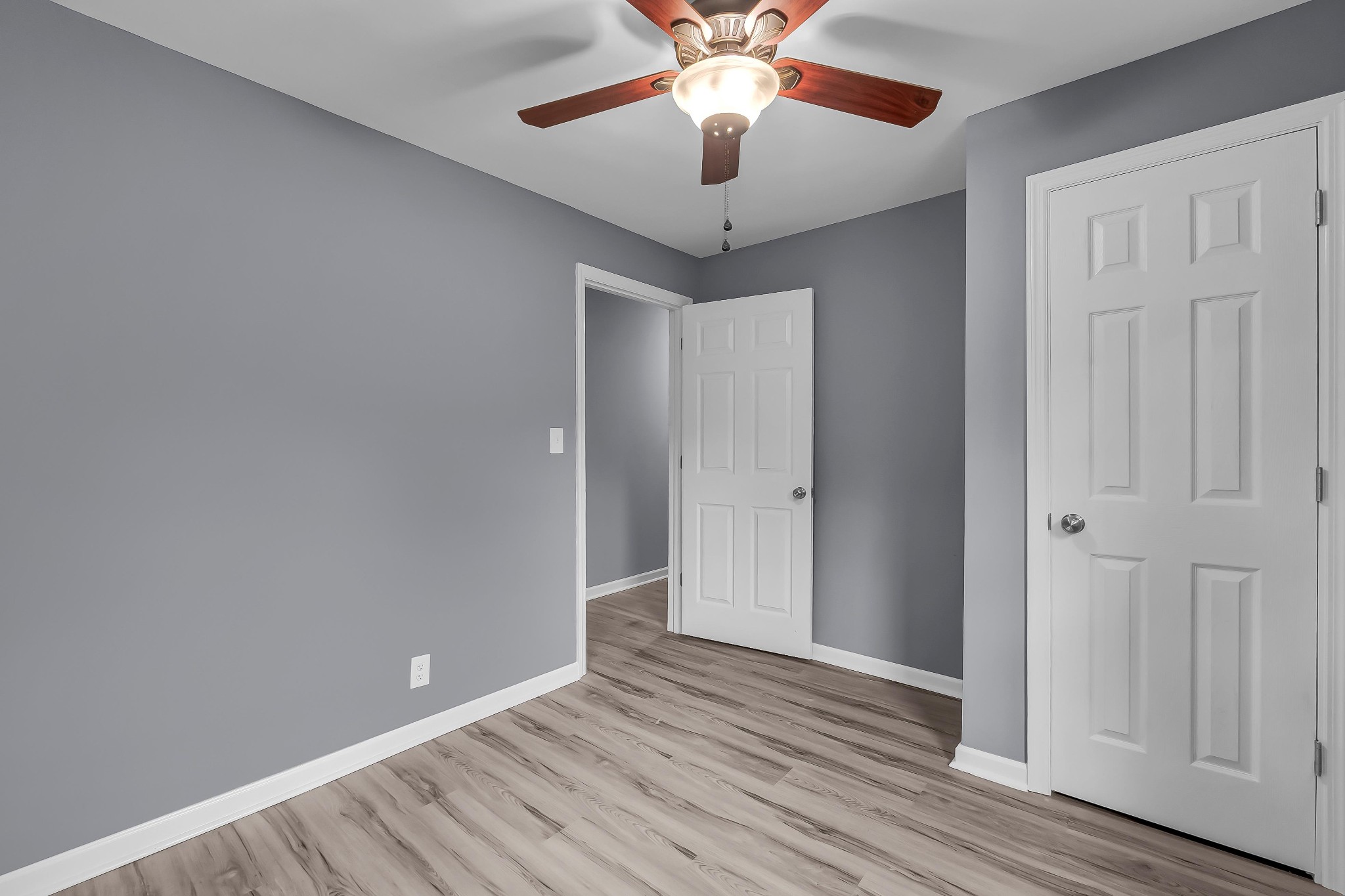 99 Anthony Mill Road Tullahoma, TN 37388 - Photo 20 of 37 an empty room with wooden floor and windows