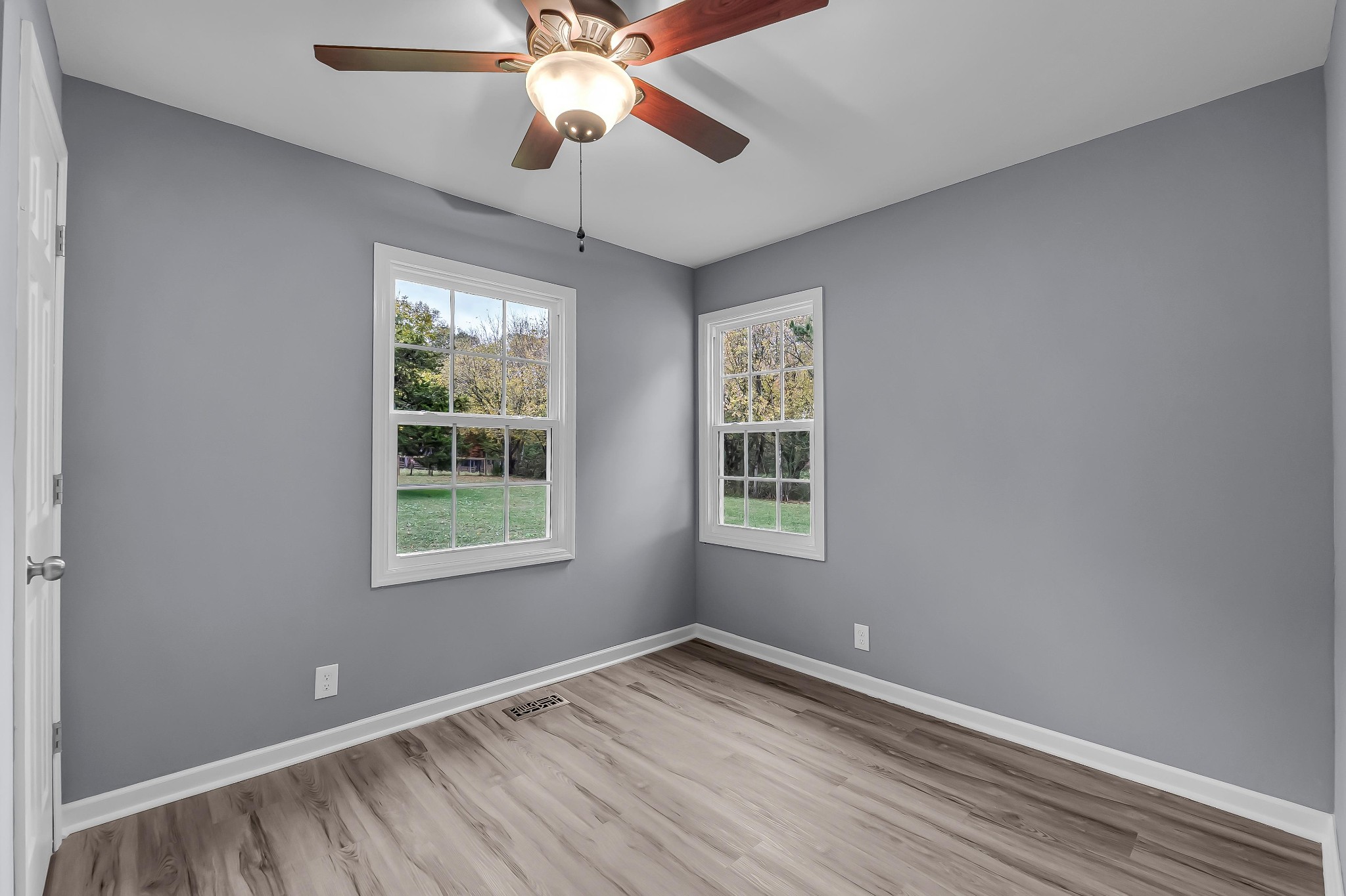 99 Anthony Mill Road Tullahoma, TN 37388 - Photo 21 of 37 an empty room with a window and a fan