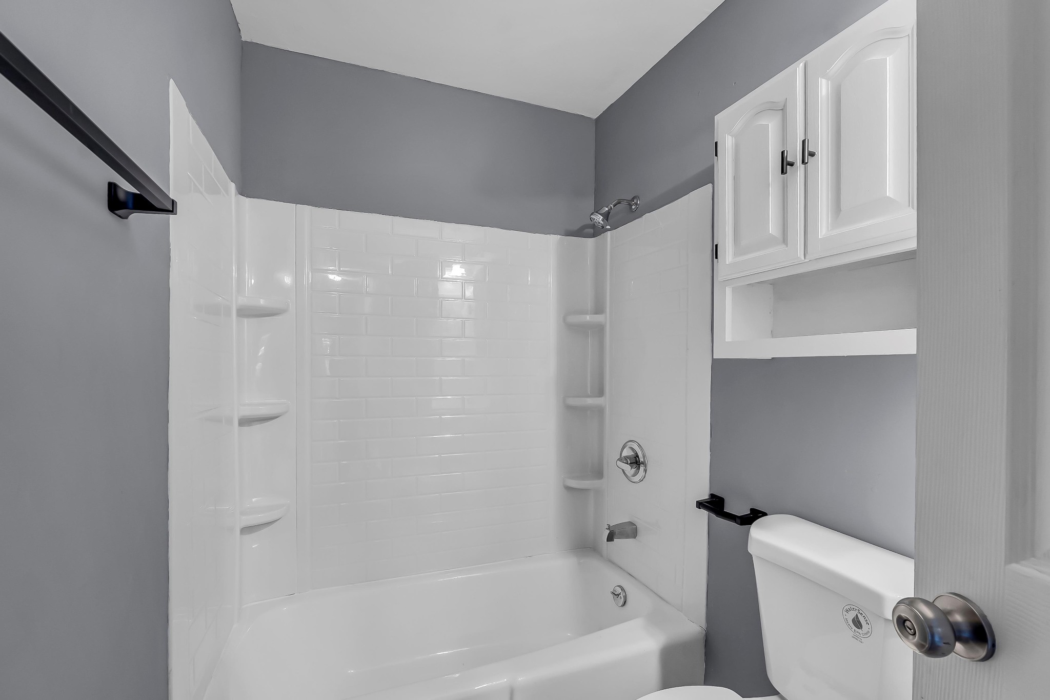 99 Anthony Mill Road Tullahoma, TN 37388 - Photo 27 of 37 a bathroom with a bathtub a toilet and a shower