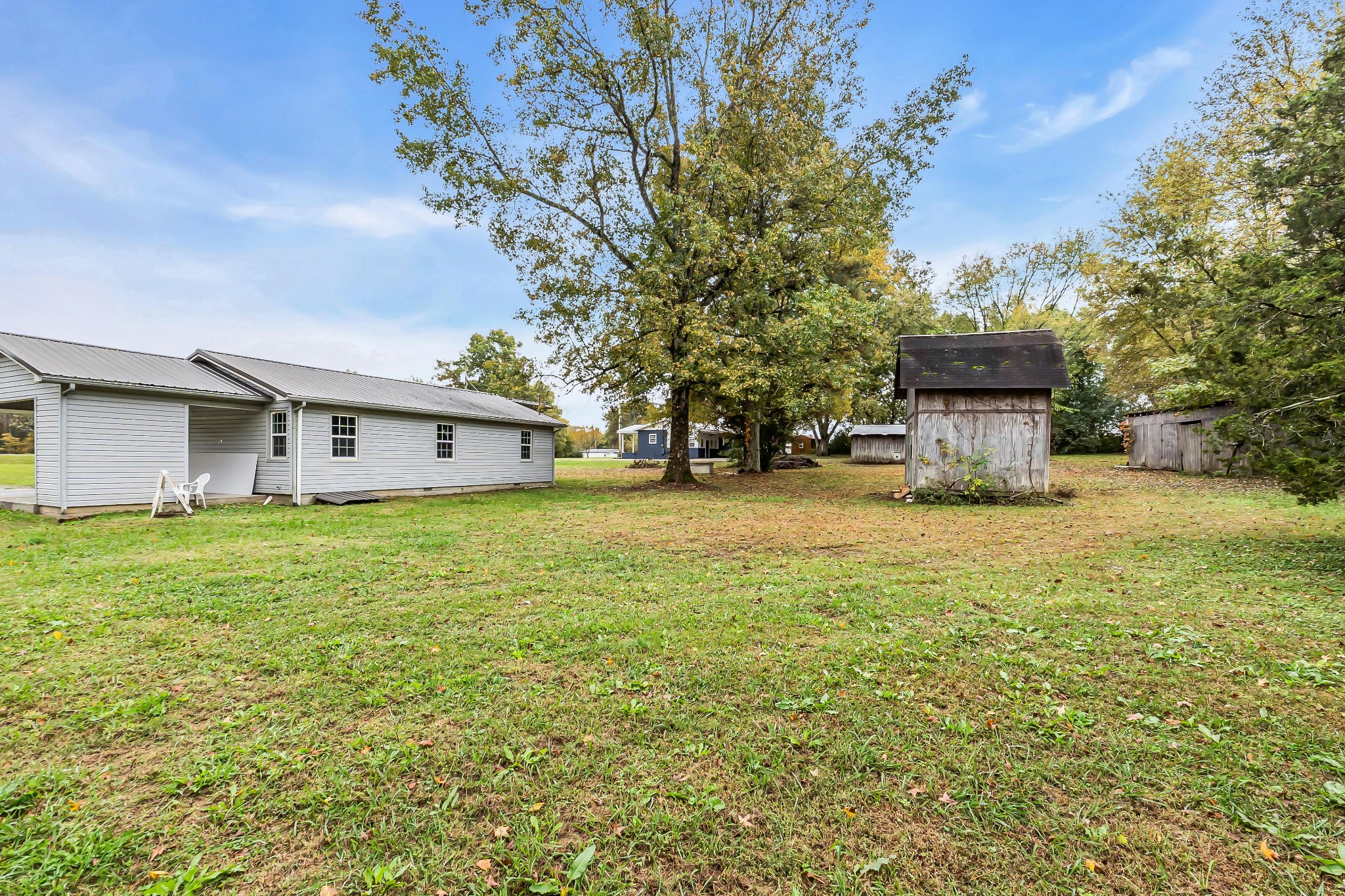 99 Anthony Mill Road Tullahoma, TN 37388 - Photo 34 of 37 a front view of a house with a yard and garage