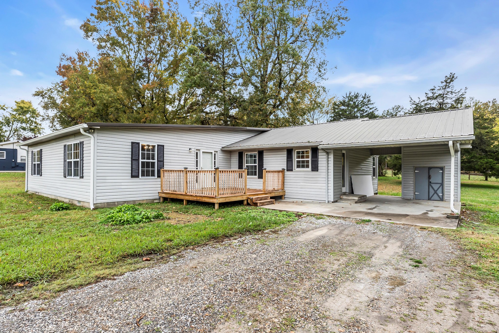99 Anthony Mill Road Tullahoma, TN 37388 - Photo 4 of 37 a view of a house with a yard and sitting area