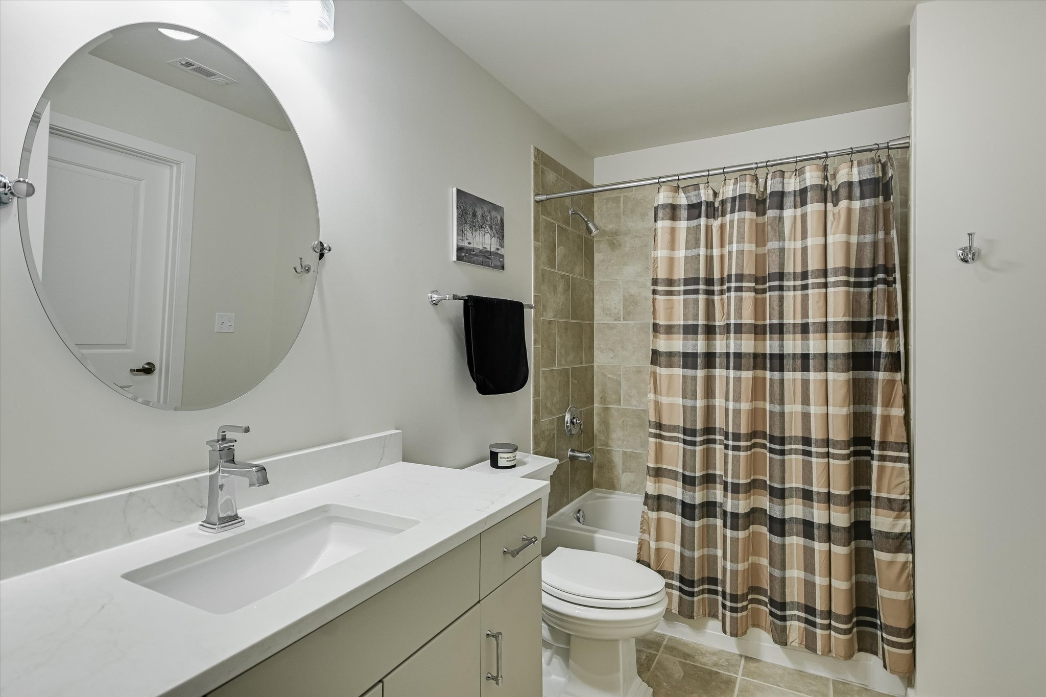 360 Nueces Street, Unit 1405 Austin, TX 78701 - Photo 22 of 40 a bathroom with a sink toilet and shower