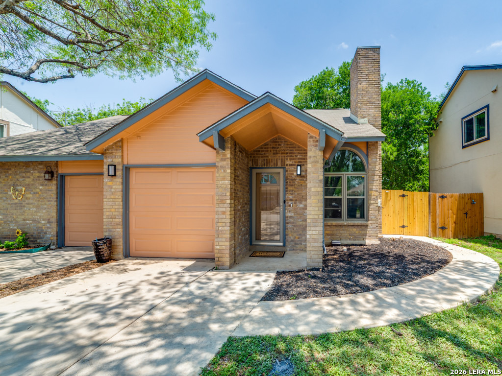 3439 Ridge Ranch San Antonio, TX 78247 - Photo 2 of 25 a view of a house with backyard and tree
