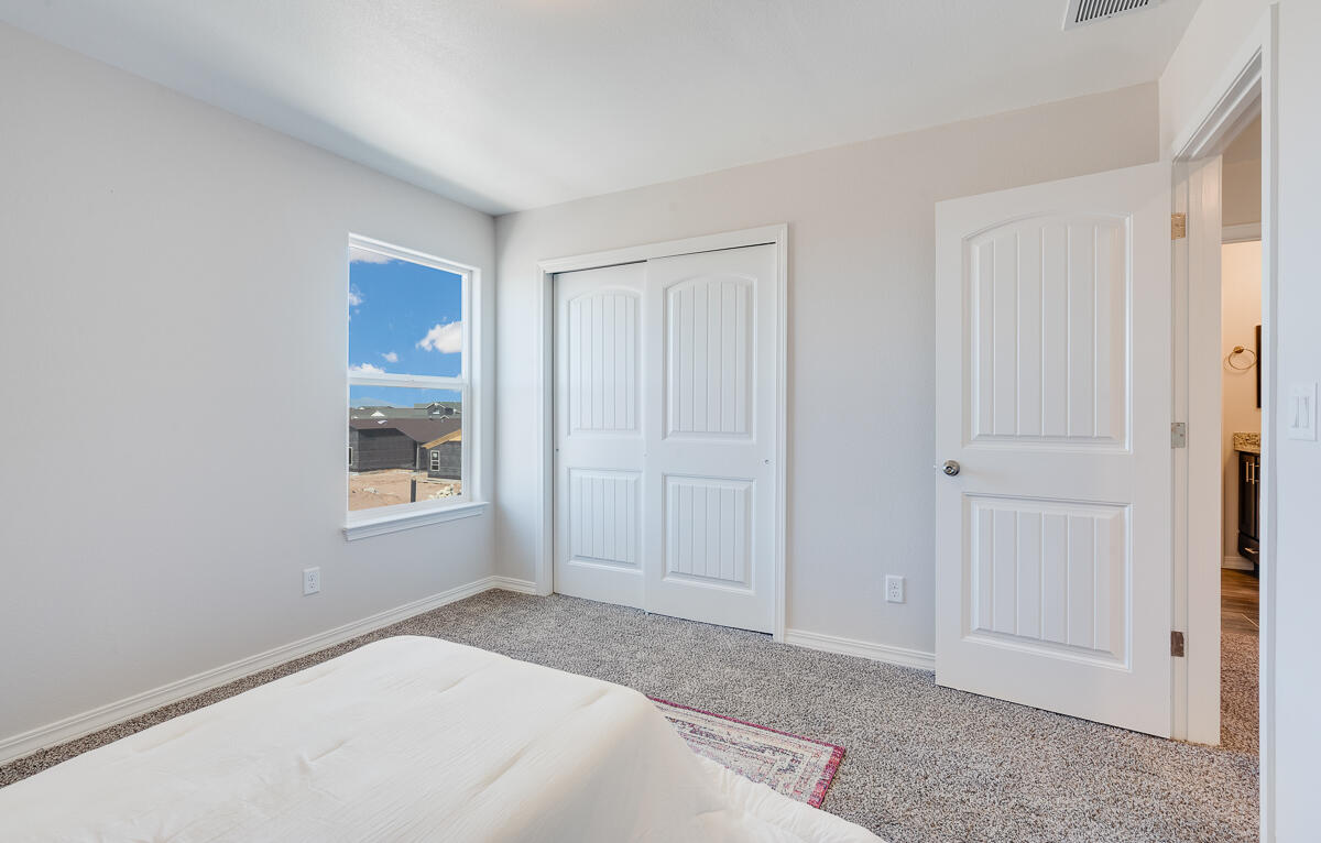 103 Water Tank Road Sunland Park, NM 88008 - Photo 13 of 22 a view of an empty room and window