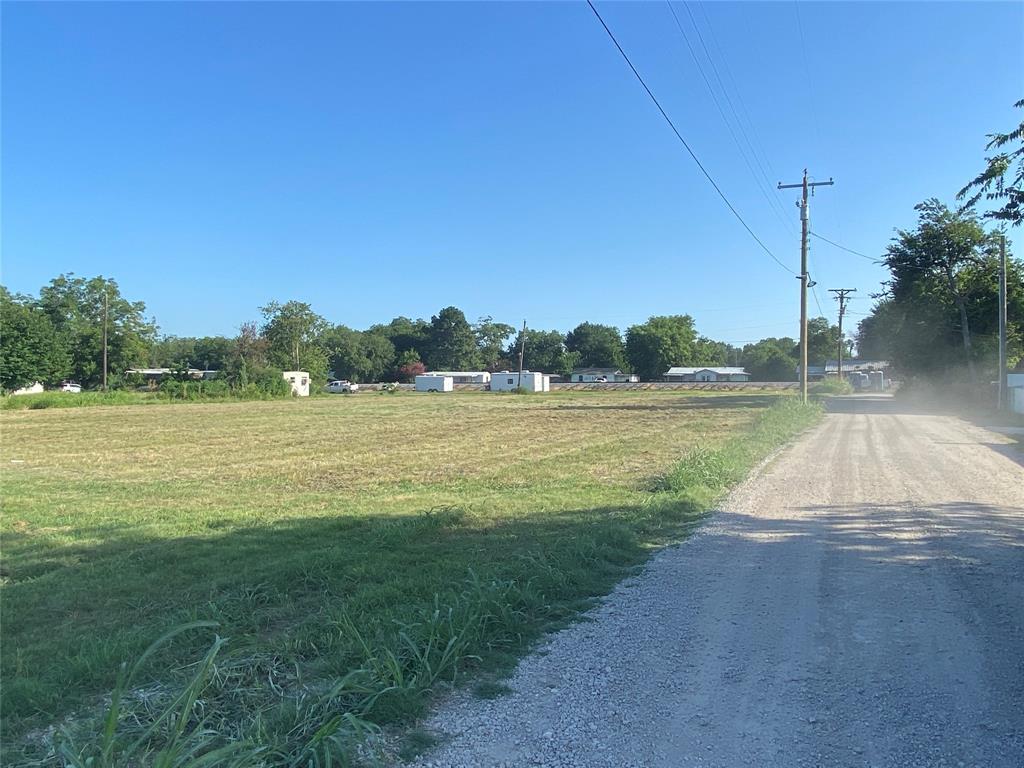 Tbd Ash Lane Wills Point, TX 75169 - Photo 6 of 9 a view of a lake with a big yard