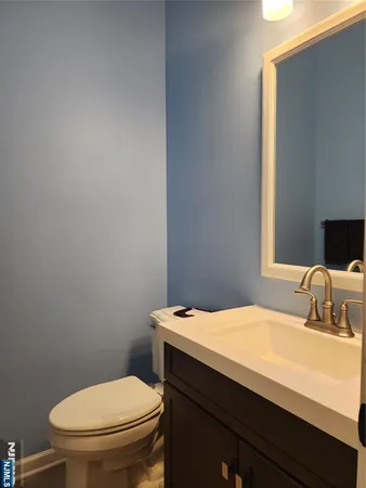 a bathroom with a sink and a toilet