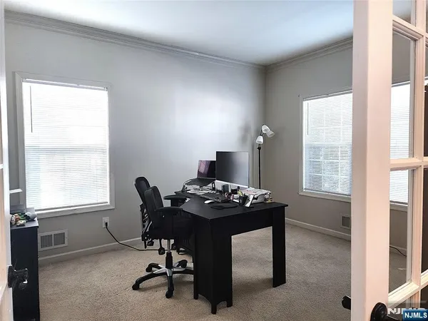 a table and a stove sitting inside of a room