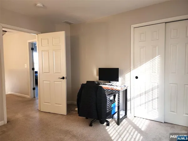 a view of workspace with lounge chair