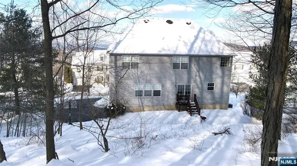a view of outdoor space with lots of trees