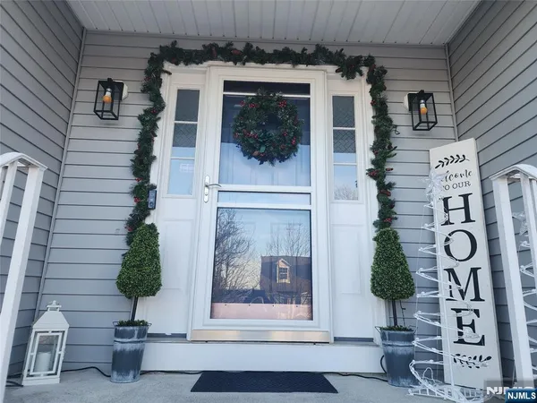 a vase of flowers sitting on a table