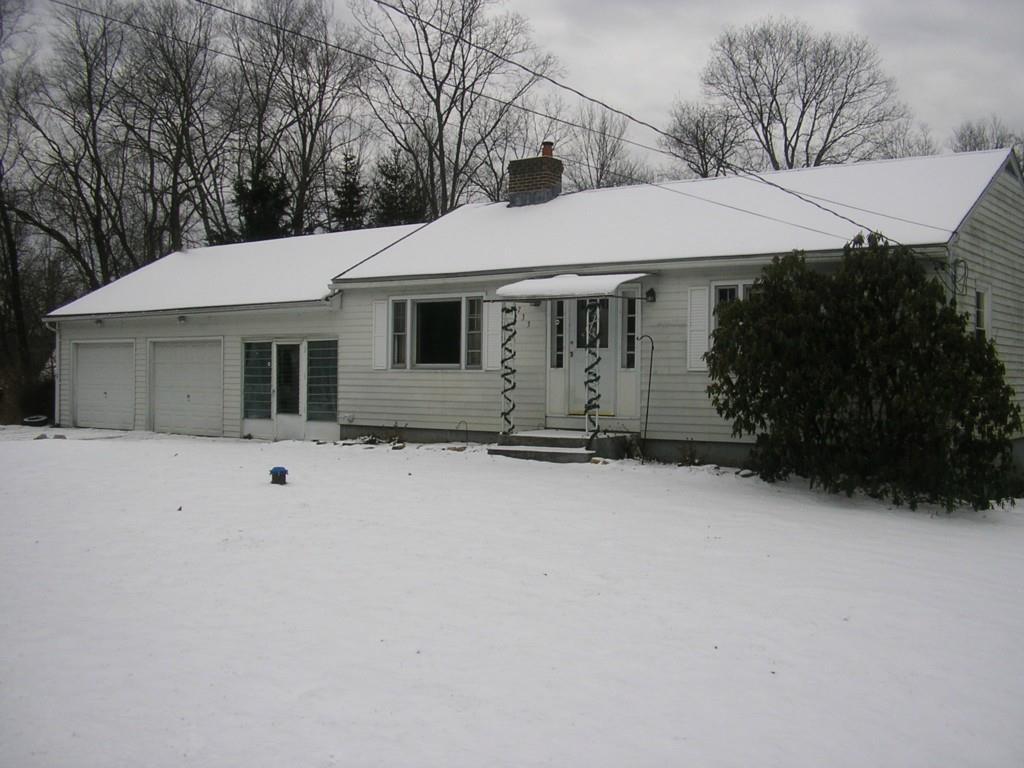 733 Hill Road Harwinton, CT 06791 - Photo 1 of 1 a house with trees in the background