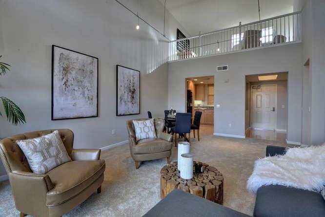 1310 Saddle Rack Street, Unit 432 San Jose, CA 95126 - Photo 3 of 10 a living room with furniture and a chandelier
