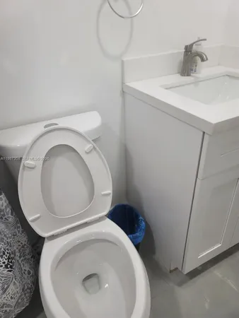 a close view of a washer and dryer in a bathroom