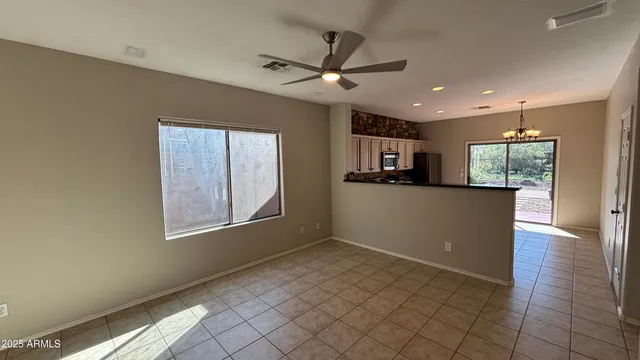 a view of a kitchen with a sink and a window