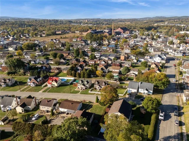 an aerial view of a city with lots of residential buildings