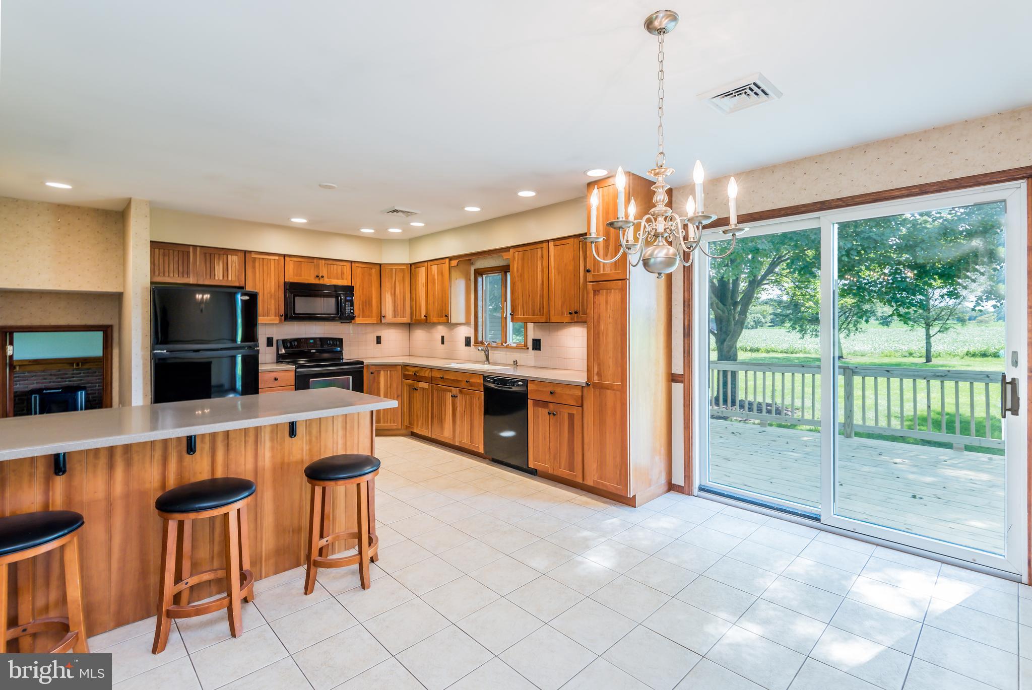 203 North Locust Point Road Mechanicsburg, PA 17050 - Photo 8 of 25 Dining Area Looks Over Deck