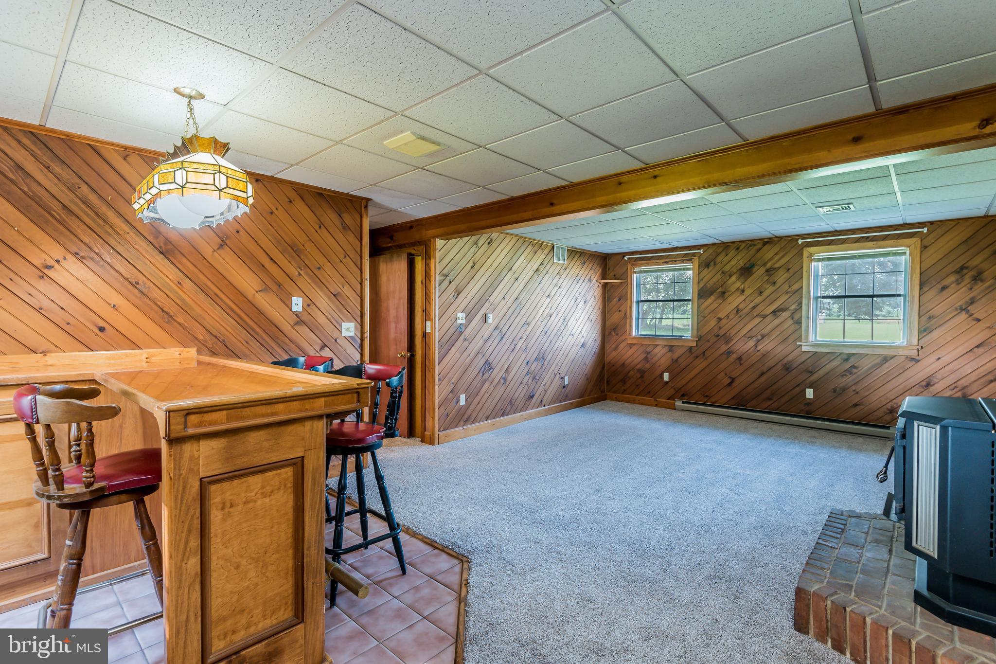 203 North Locust Point Road Mechanicsburg, PA 17050 - Photo 10 of 25 Family Room with Pellet Stove!