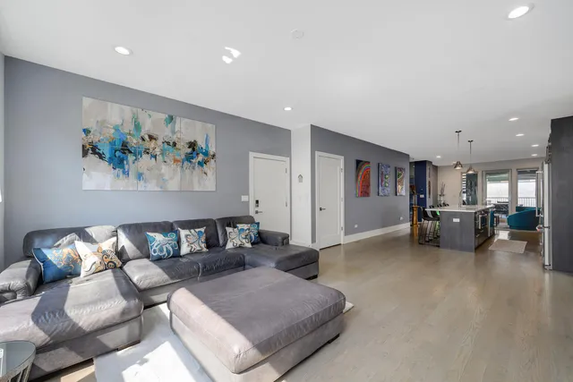 a living room with furniture and a table