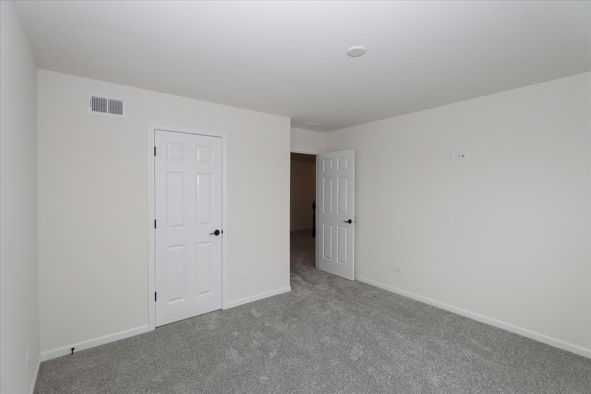 10782 Chadsey Road Huntley, IL 60142 - Photo 31 of 33 a view of an empty room