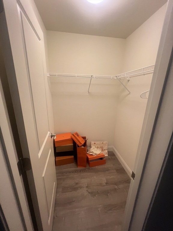 51 Everit Avenue, Unit B Framingham, MA 01702 - Photo 6 of 14 a view of a room with racks on the wall