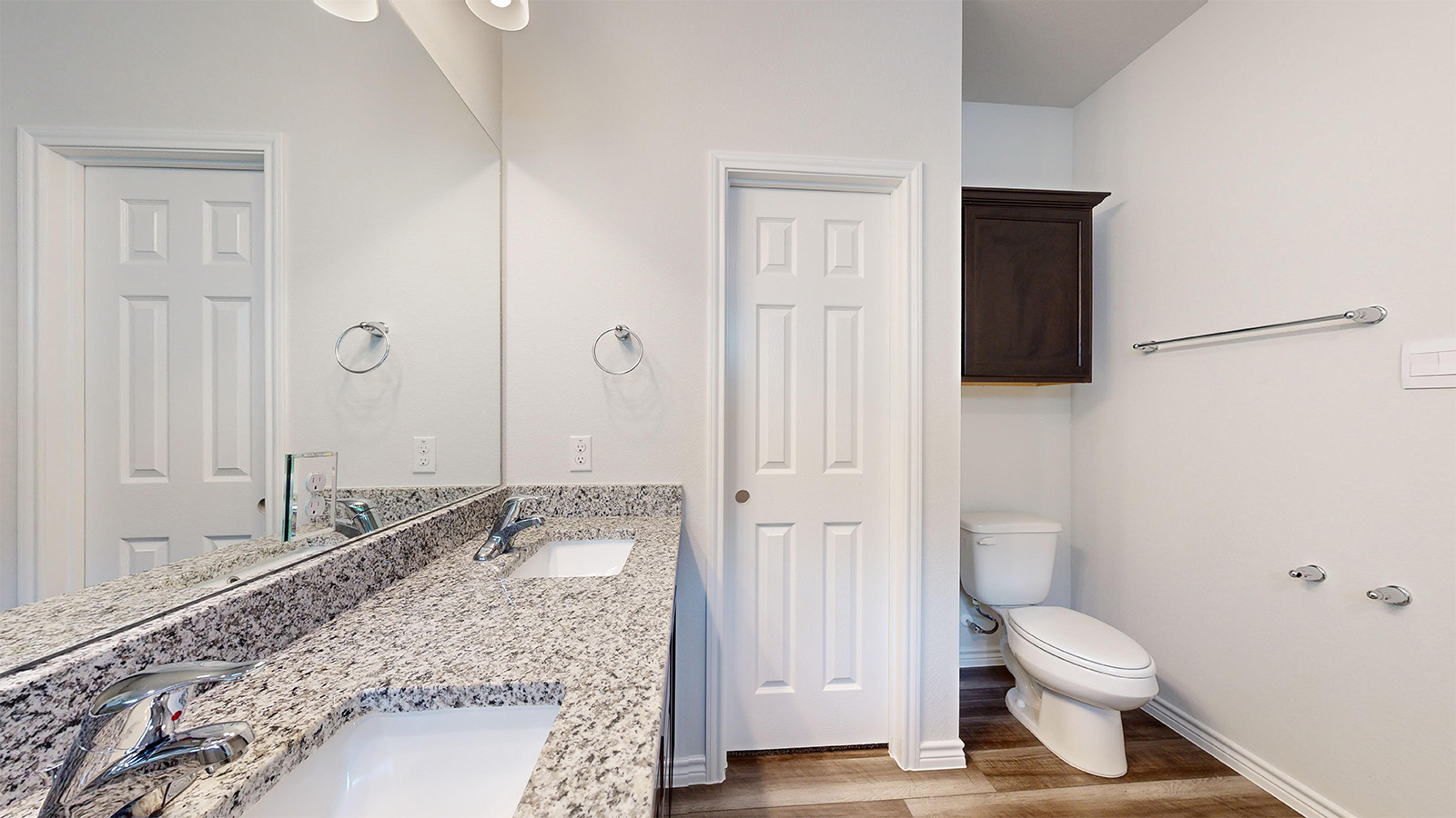 408 Creekfall Road Burnet, TX 78611 - Photo 13 of 21 a bathroom with a granite countertop sink a toilet and shower