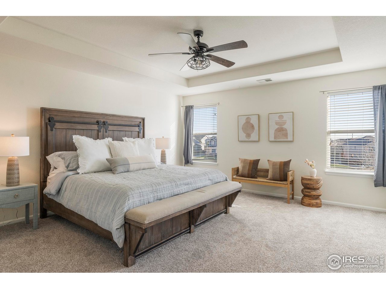 13420 Spruce Street Thornton, CO 80602 - Photo 20 of 48 a bed room with a bed and a couch