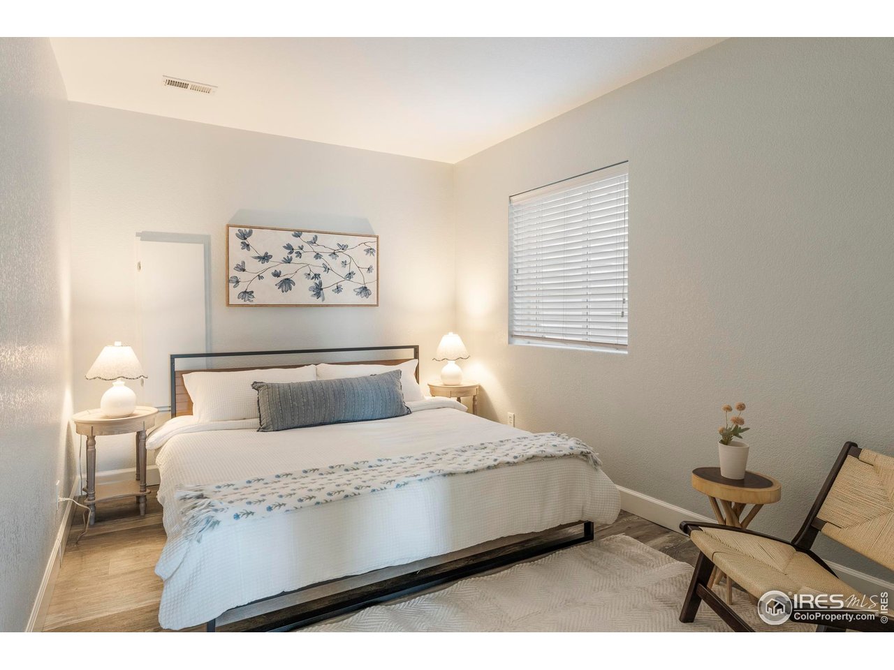 13420 Spruce Street Thornton, CO 80602 - Photo 40 of 48 a bedroom with a bed and window