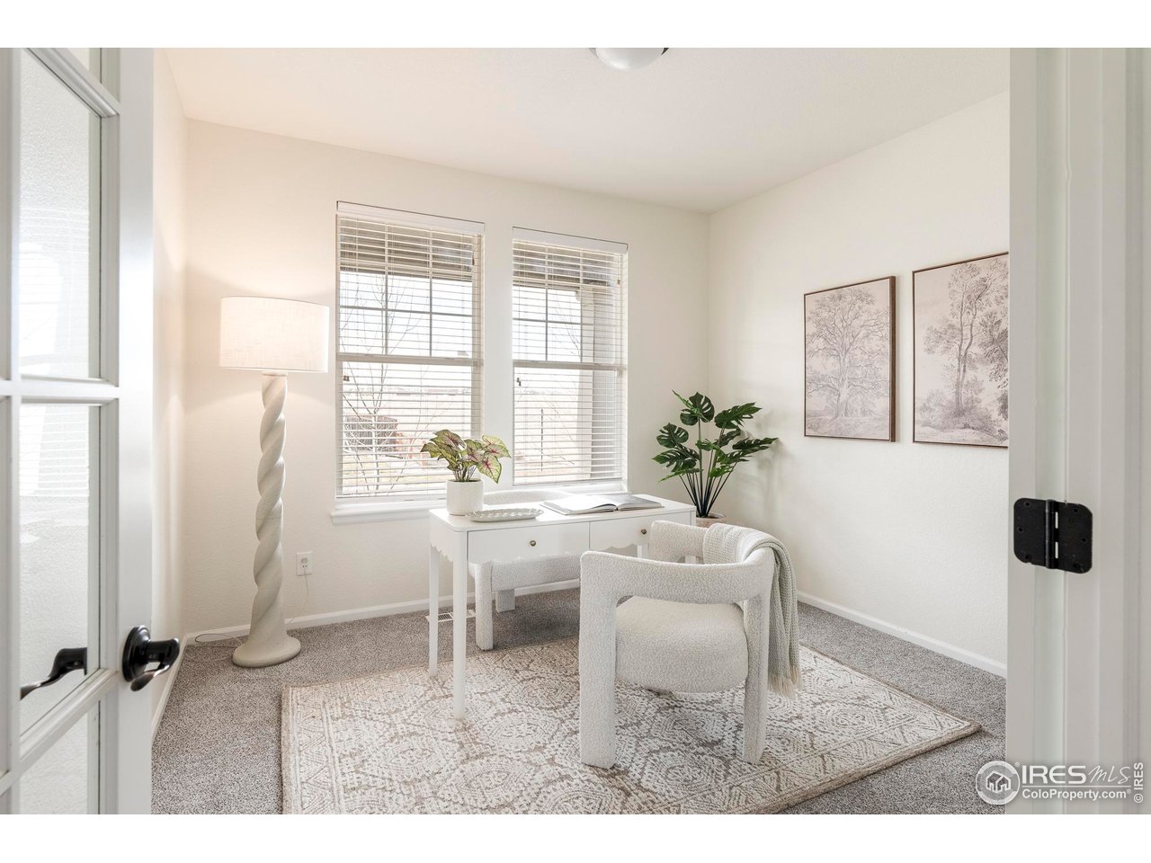 13420 Spruce Street Thornton, CO 80602 - Photo 10 of 48 a living room with furniture and wooden floor