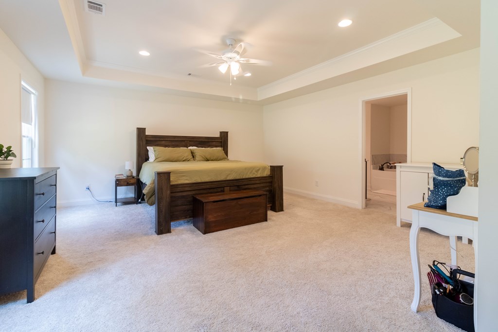 25 Veterans Court Fort Mitchell, AL 36856 - Photo 22 of 32 a bed room with a bed and a television
