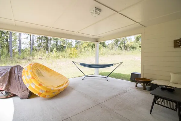 a view of a room with a large window