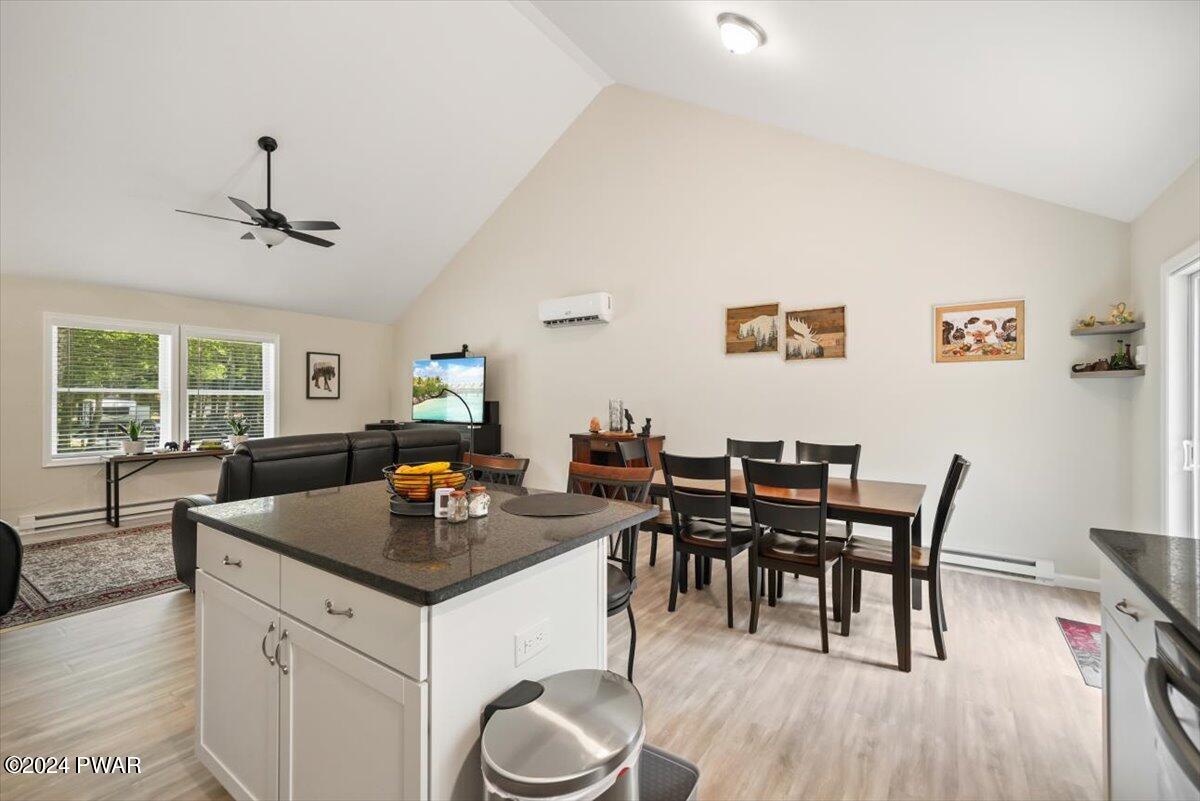 133 Butternut Road Milford, PA 18337 - Photo 12 of 34 a view of a dining room with furniture and wooden floor
