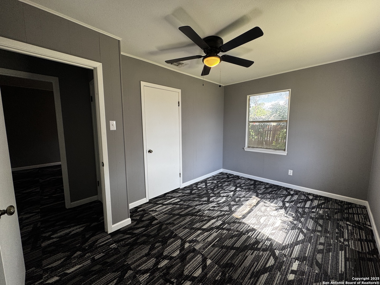 19518 Florence Street Lytle, TX 78052 - Photo 16 of 16 a bedroom with bed and a window