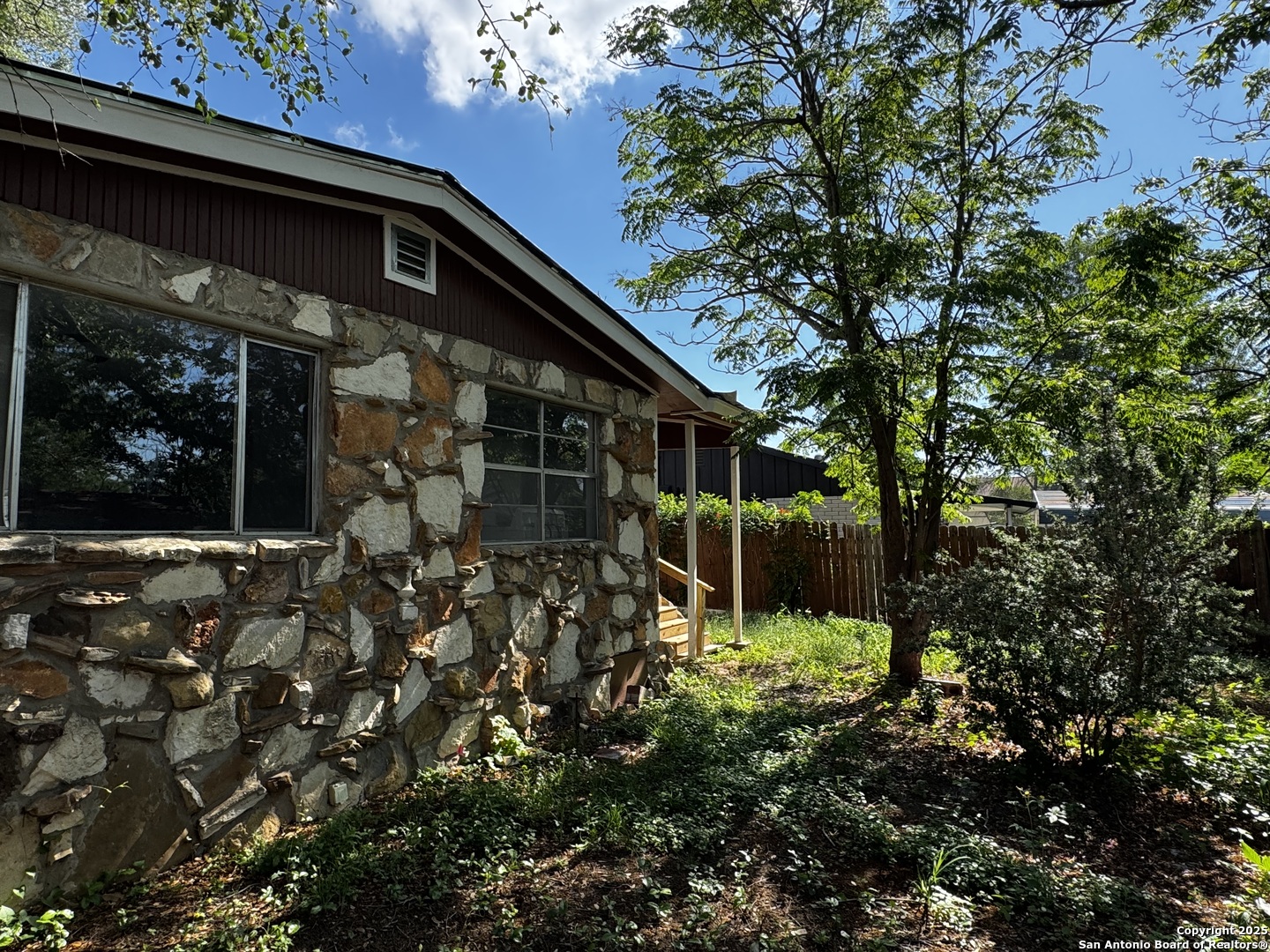 19518 Florence Street Lytle, TX 78052 - Photo 4 of 16 a view of a small garden