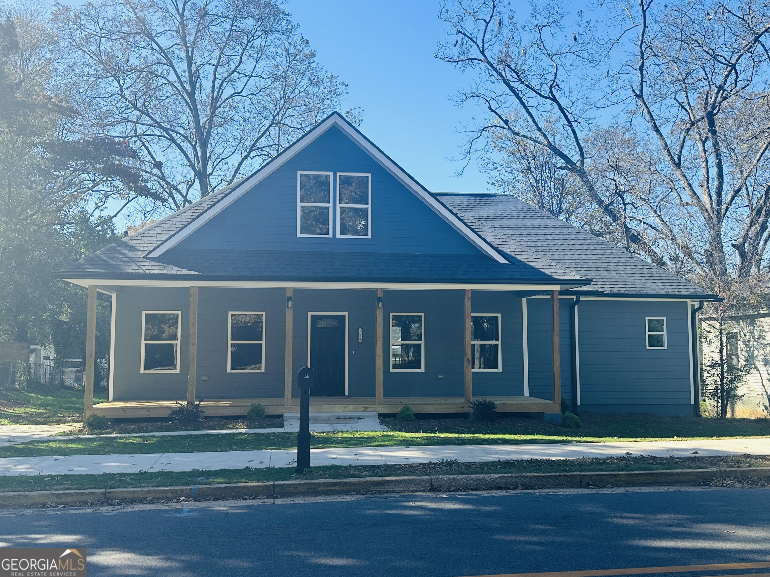 119 F Street Thomaston, GA 30286 - Photo 2 of 27 a front view of a house with a small yard