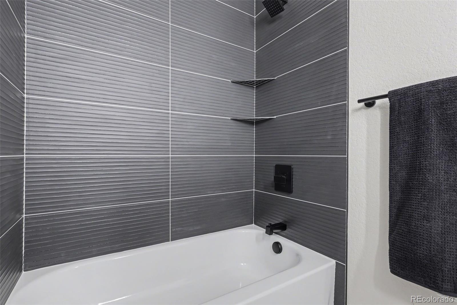 1002 Milky Way Colorado Springs, CO 80905 - Photo 23 of 39 a bathroom with a bathtub
