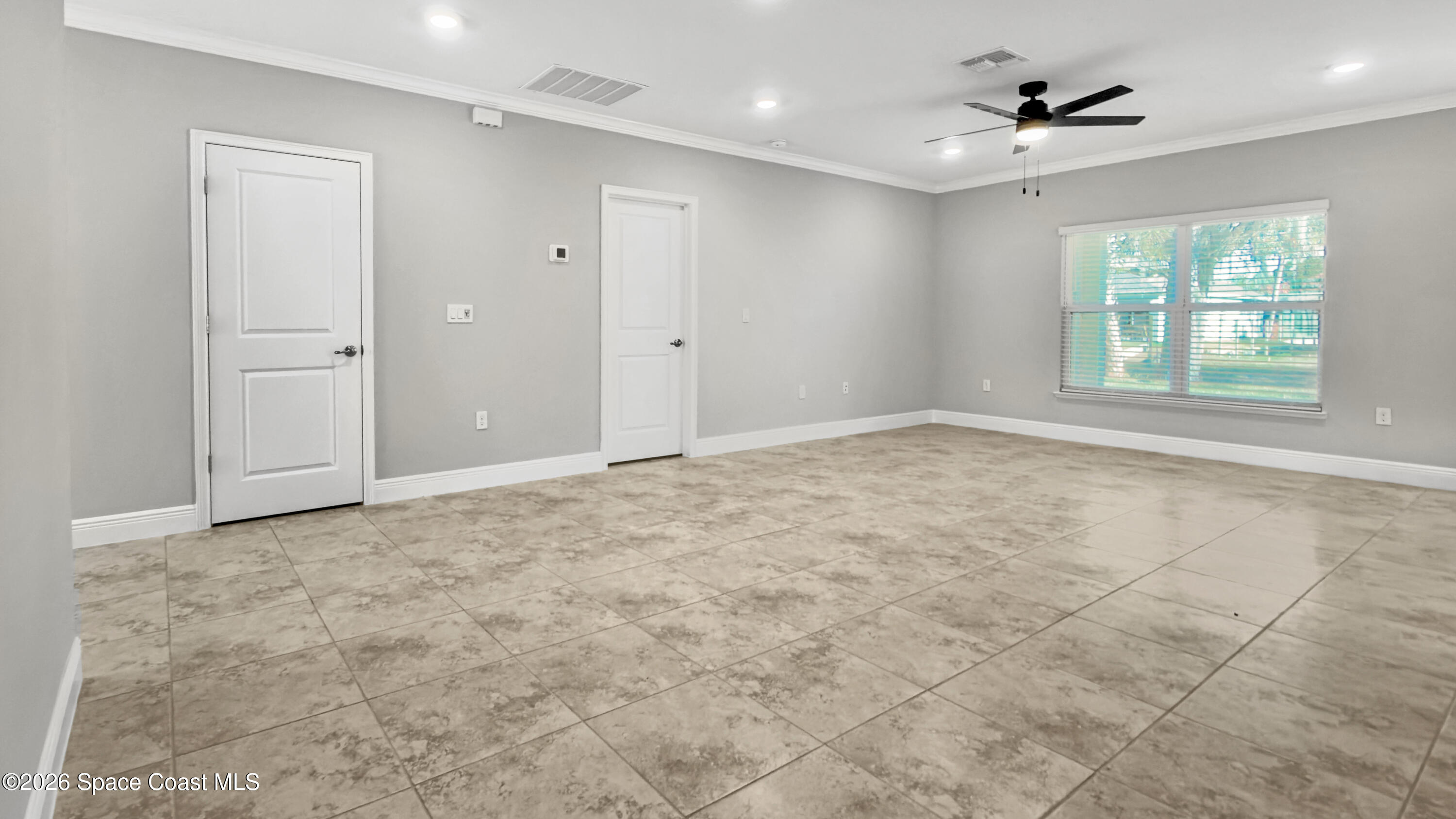 594 Bayharbor Terrace Sebastian, FL 32958 - Photo 11 of 34 a view of an empty room with a window