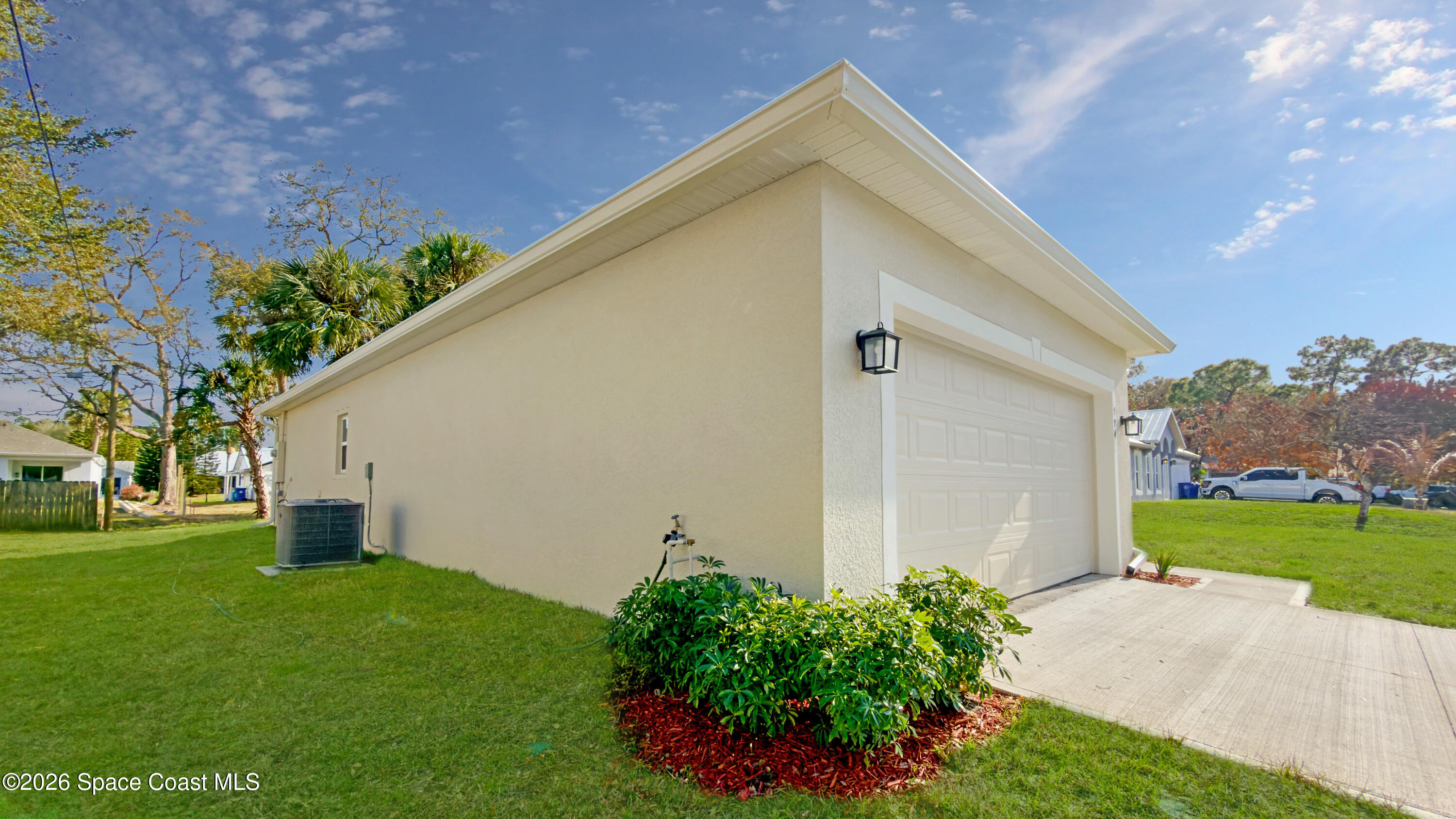 594 Bayharbor Terrace Sebastian, FL 32958 - Photo 27 of 34 a house view with a garden space