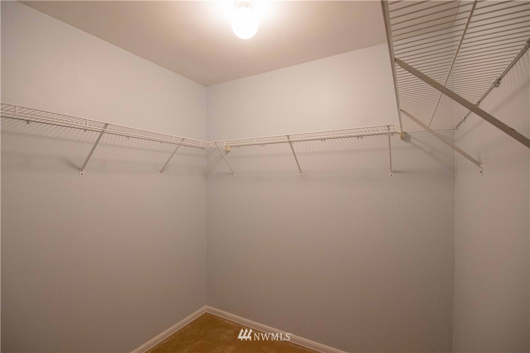 15150 140th Way Southeast, Unit G104 Renton, WA 98058 - Photo 11 of 24 a view of a rack on the wall