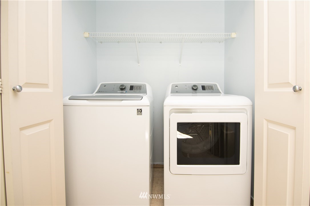 15150 140th Way Southeast, Unit G104 Renton, WA 98058 - Photo 15 of 24 a utility room with dryer and washer