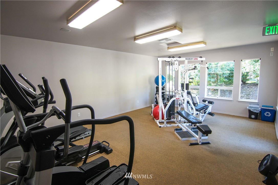 15150 140th Way Southeast, Unit G104 Renton, WA 98058 - Photo 21 of 24 a view of a room with gym equipment