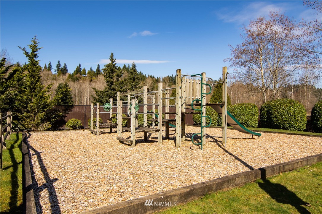 15150 140th Way Southeast, Unit G104 Renton, WA 98058 - Photo 24 of 24 a view of a terrace with chairs