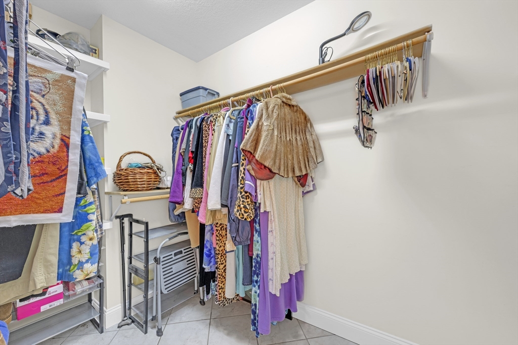 12 Malboeuf Road Ware, MA 01082 - Photo 20 of 42 a view of walk in closet with clothes