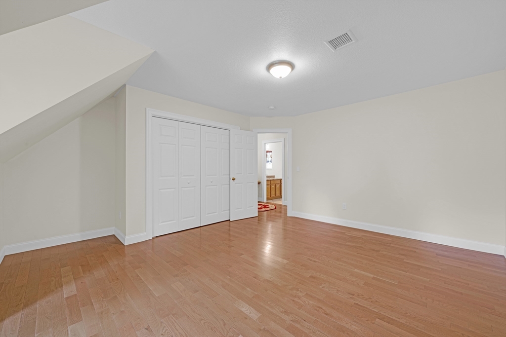 12 Malboeuf Road Ware, MA 01082 - Photo 21 of 42 a view of an empty room and wooden floor