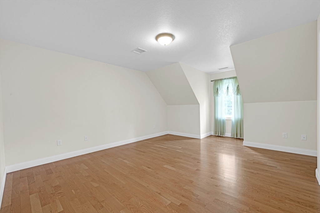 12 Malboeuf Road Ware, MA 01082 - Photo 22 of 42 a view of an empty room with wooden floor
