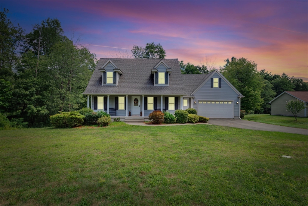 12 Malboeuf Road Ware, MA 01082 - Photo 3 of 42 a front view of a house with garden