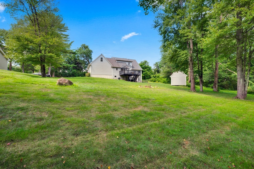 12 Malboeuf Road Ware, MA 01082 - Photo 35 of 42 a view of a backyard with a garden and trees