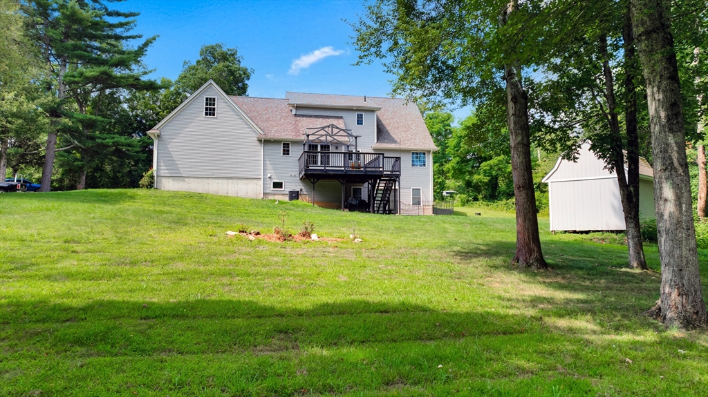 12 Malboeuf Road Ware, MA 01082 - Photo 38 of 42 a view of an house with backyard and a tree