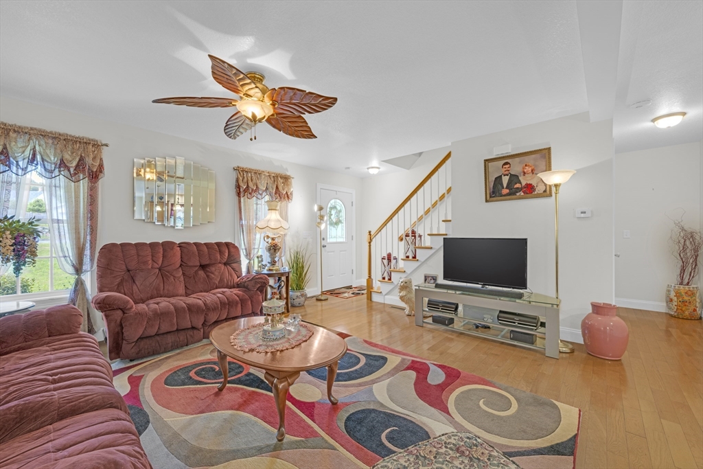 12 Malboeuf Road Ware, MA 01082 - Photo 4 of 42 a living room with furniture and a flat screen tv